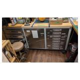 Three section roll around workbench with rock