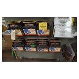 Pistol cleaning kits shell casings etc on wall