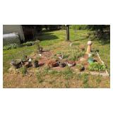 Remaining flower pots, bird baths, etc in yard