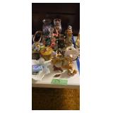 Figurines and glassware as shown