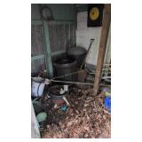 Contents of shed, trash cans, snow, shovel,