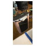 Clothes hamper with metal magazine stand