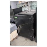Large black safe on wheels 33x. Combination