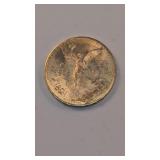 1944 Mexican 50 peso gold coin looks to be