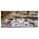 lot of space related items t-shirts stickers