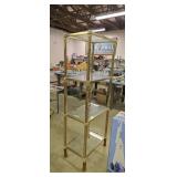 brass and glass upright stand