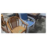three patio stacking chairs and rattan armchair