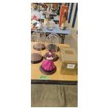 Barbie figure with glass dome displays
