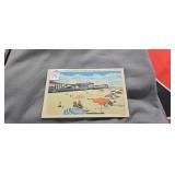 Postcard Beach, Boardwalk, And Cottage Line