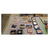 lot of commemorative Christmas ornaments