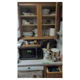 items in kitchen cabinets and drawers as shown