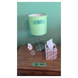 pair of retro style lamps and items on top of