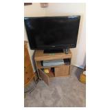 Magnavox 36 inch flat screen TV with vcr and stand