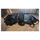 lot of carry bags located under table
