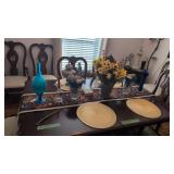 items on dining room table vases candle holders