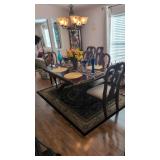 dining room table with eight carved Queen Anne