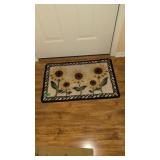 pair of rugs located in entryway