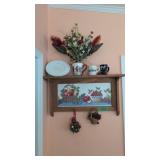 wall shelf with items on top as shown