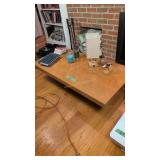 coffee table with figures lamp candles etc