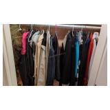 lot of jackets and coats in closet