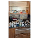 Items On Kitchen Counter And In Cabinet Cups