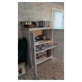 Wooden Double Door Cabinet With Vhs Tapes And