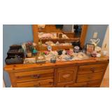 items on dresser costume jewelry figurines