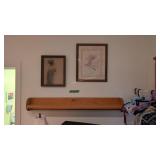 pair of framed prints and wall shelf