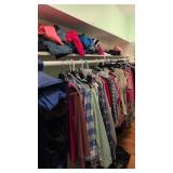 contents of walk-in closet shirts jackets shoes
