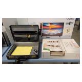 Vizio 27 inch TV in the box briefcase closet