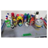 cleaning supplies on and under table