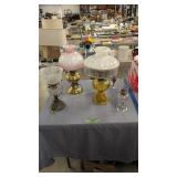 collection of antique oil lamps