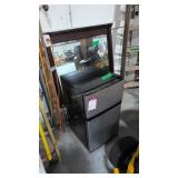small countertop refrigerator working with mirror