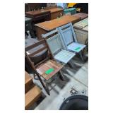 three vintage wooden folding chairs