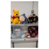 Winnie the Pooh and various stuffed animals as