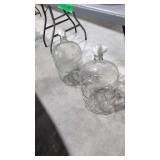 two glass 5 gallon water bottles