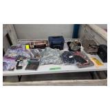 lot of hunting items clothing gun cleaning kits