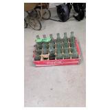 wooden Coca-Cola crate with bottles