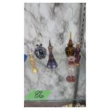 six glass perfume bottles