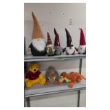 Winnie the pooh, gnomes, stuffed animals as shown