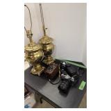 table lamps and vintage cameras