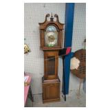 tall case clock with weights and pendulum