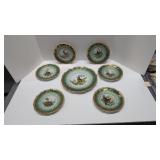 seven piece Victorian style game plate set made