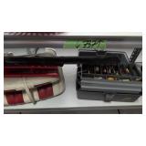 tackle box with fishing lures boat seat glasses