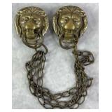C. 1910 Brass Lion Cloak Clasps