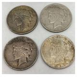 Lot of Four United States Peace Silver Dollars (1923-1926)