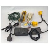 Collection of Assorted Electrical Cords, Plug Ends, and Power Strips