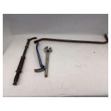 Assorted Hand Tools: Crowbars and Adjustable Wrench