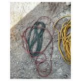 Assorted Extension Cords including Green and Red Coils