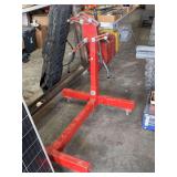 Red Metal Engine Stand with Adjustable Mounting Arms and Rolling Casters